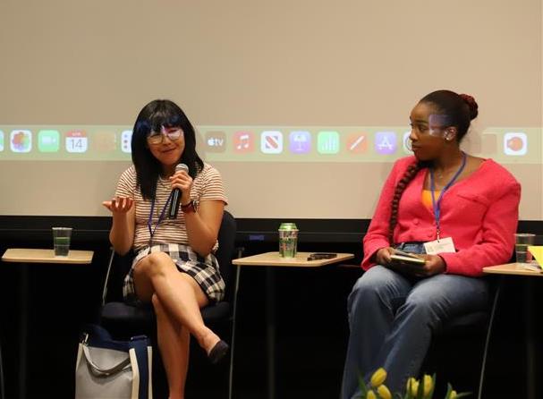 Grace Cho and Symone Howard on stage