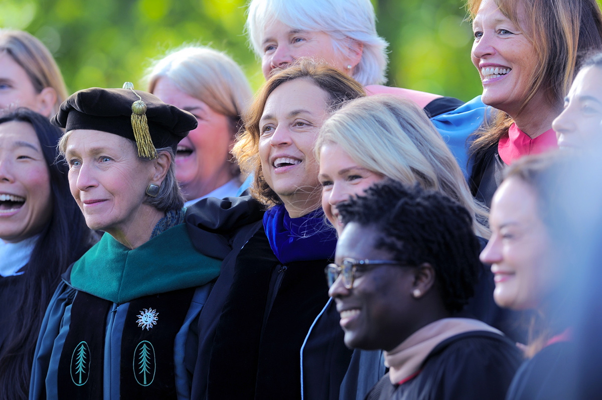 Women of Bowdoin's past, present, and future gather for a photo after the inauguration ceremony.