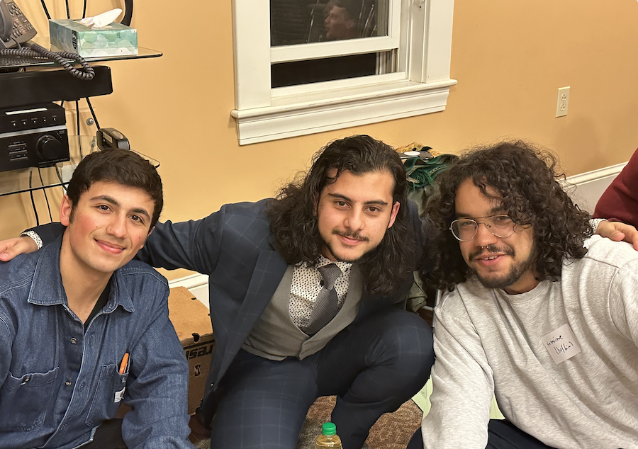 Three students at the interfaith Iftar