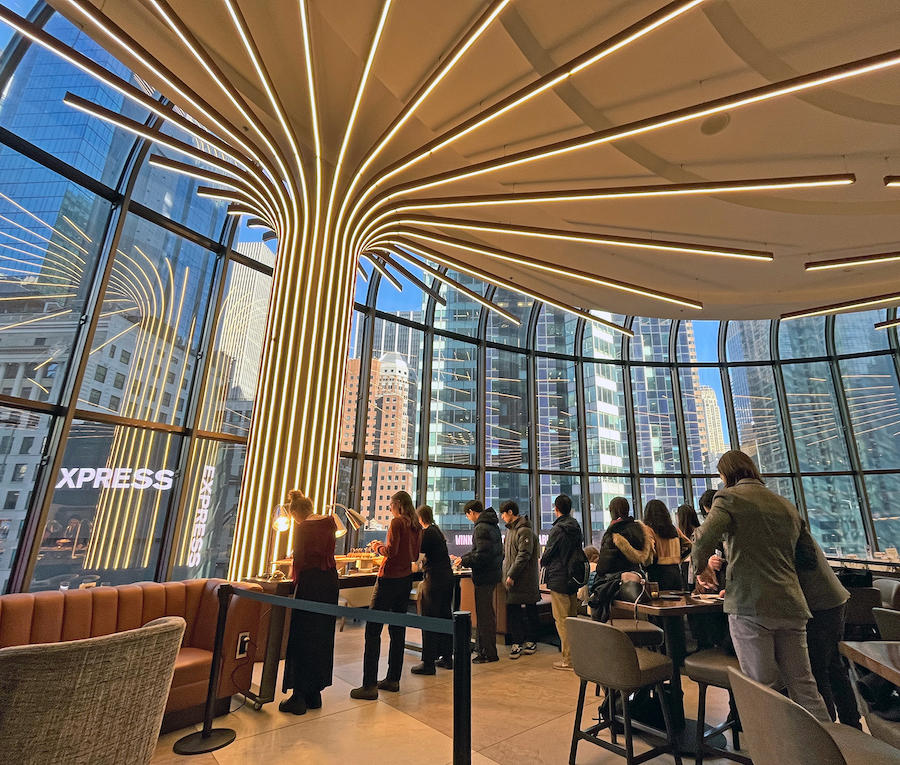 InvesTrek students in a glass skyscraper in midtown or wall street