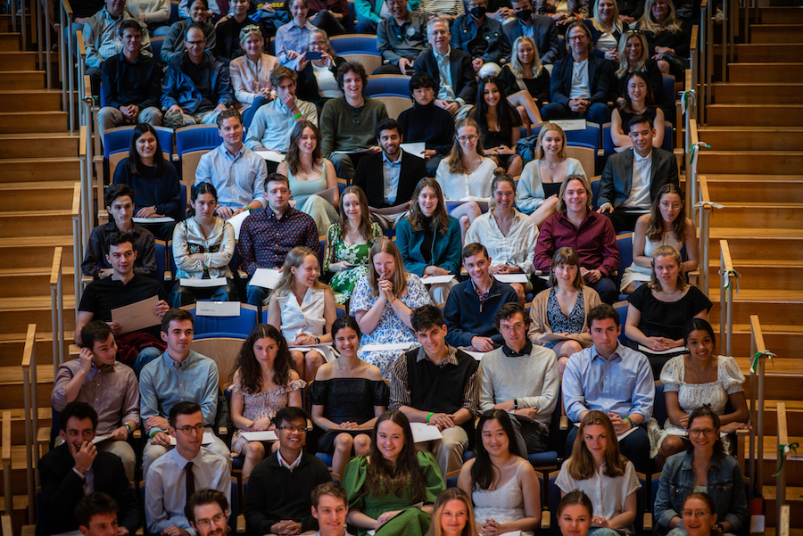 Phi Beta Kappa students in Studz with green and white ribbon