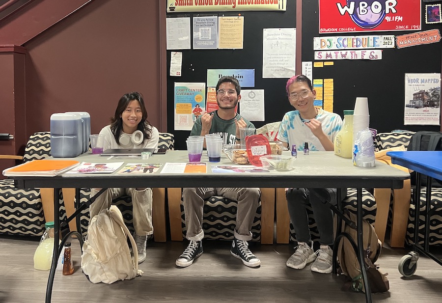 Three leaders of the Rotaract raising money for polio in Smith Union