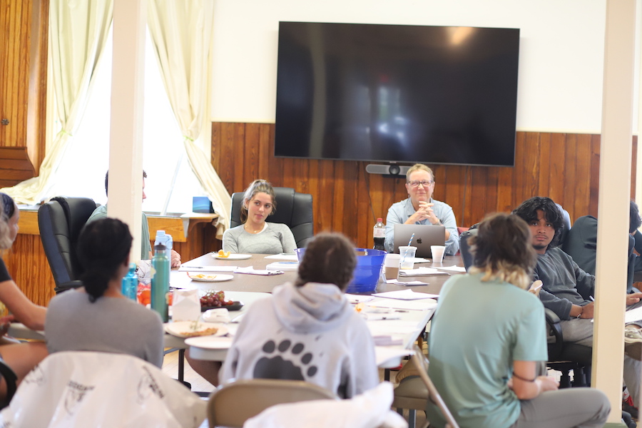Linda Nelson ’83 addresses the orientation group on day three of the Stonington orientation trip and part two of her storytelling workshop.