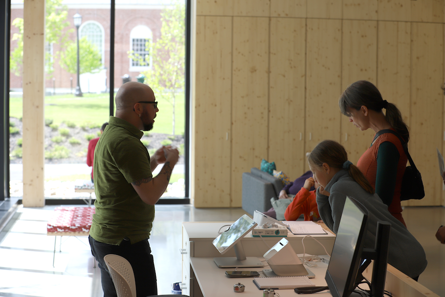 Jamey Tanzer at the entrance desk in the museum lobby.