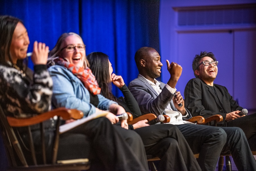 The panel shares a laugh.