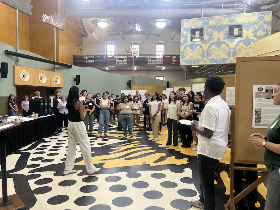 Students briefly spoke about their summertime internships.