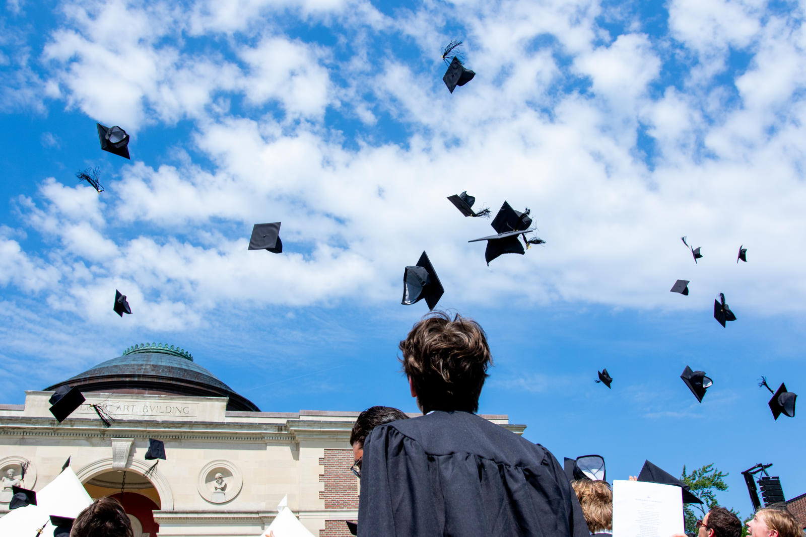 Commencement scene with mortarboards
