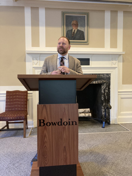 prof seth jaffe '00 lecturing at podium campus sept 2024
