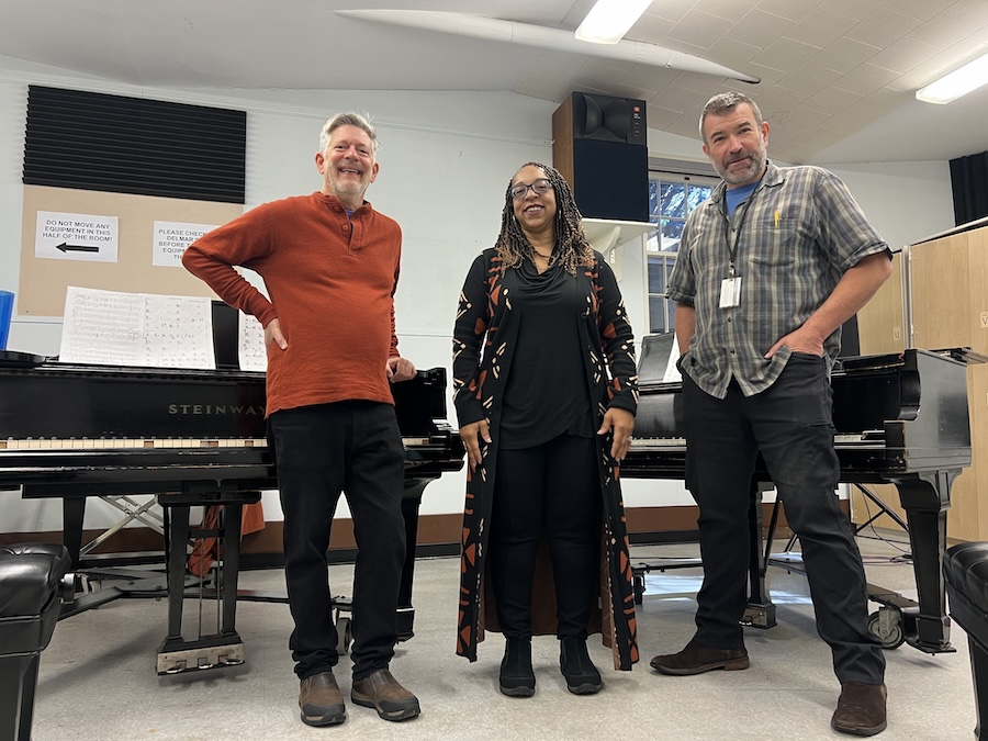 Scott Martin, Michele Reid-Vazquez and Tom Porter in front of pianos
