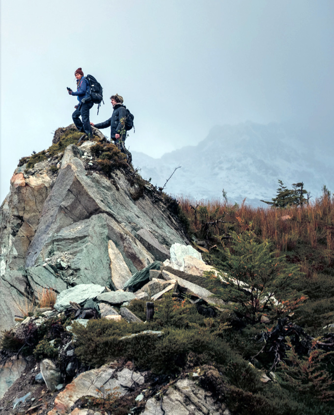Kiers and biologist and author of Entangled Life: How Fungi Make Our World, Merlin Sheldrake, atop a peak in Yendegaia National Park, Tierra del Fuego, Chile.