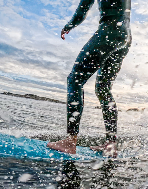 Feet on a board in the Gulf of Maine, photo by Heather Perry.