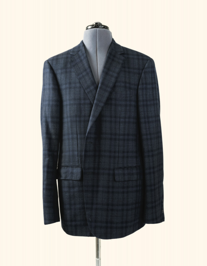 A blue windowpane jacket, like this one he made for Sene, was Charlie Davidson’s signature look.