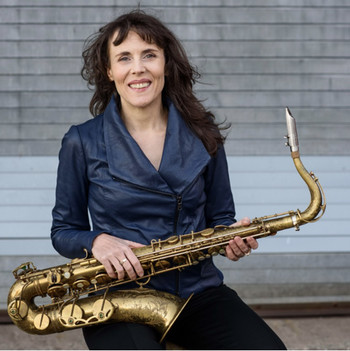 prof tracy mcmullen holding tenor sax