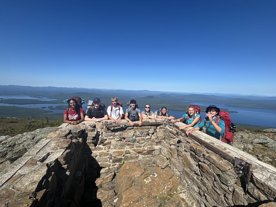 O-trip, group on a mountain summit