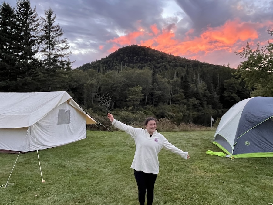 beautiful sunset behind tents