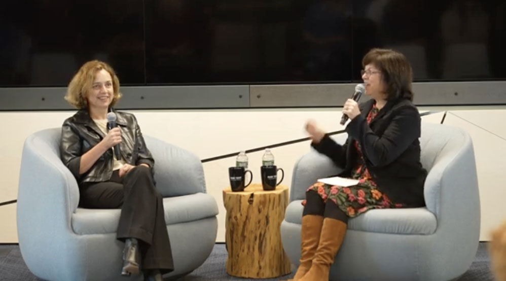 President Safa Zaki speaks with Lisa DeSisto, publisher of the Portland Press Herald
