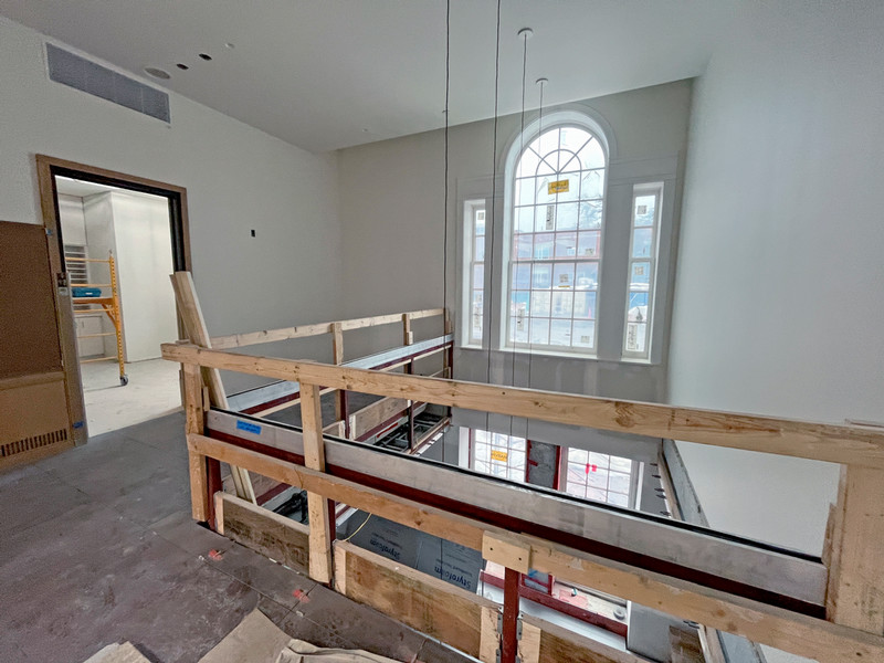 Wide view of open area. View toward faculty workroom