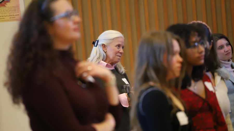 Janet Lohmann listening to Joanie's remarks