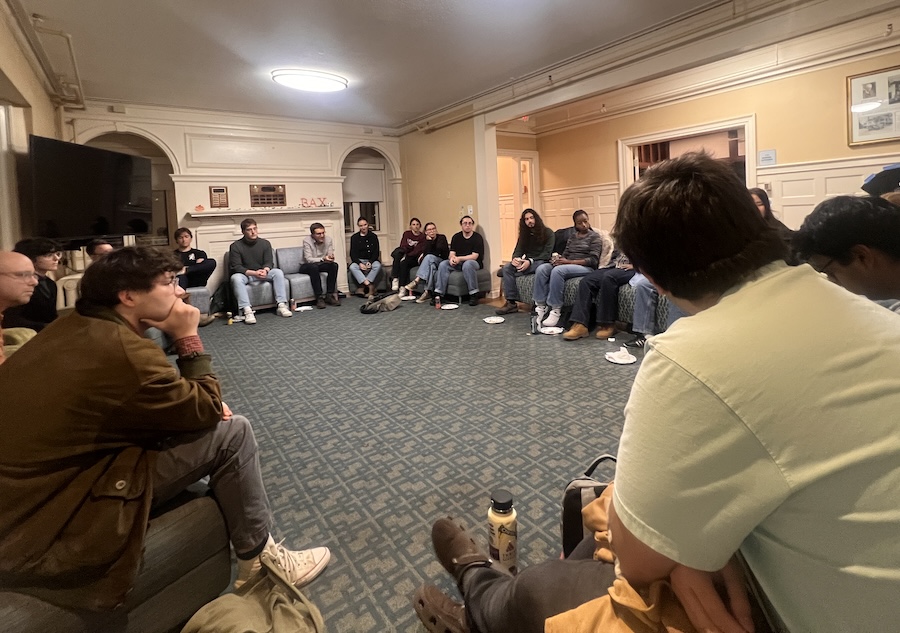 Students, and some faculty and staff, discuss AI and creativity in Baxter House.