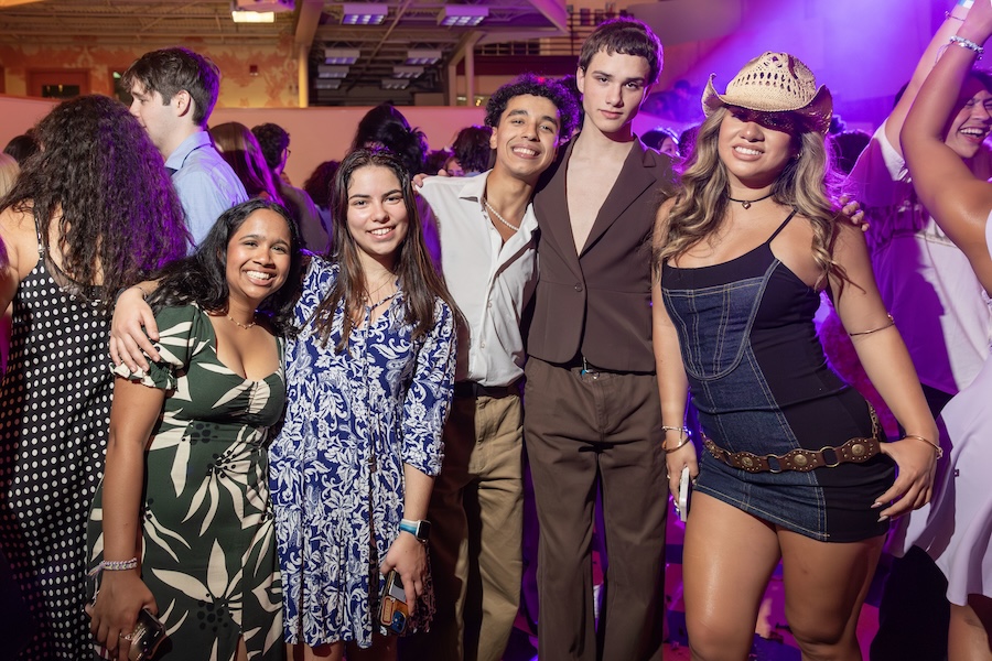 Students pose on the dance floor