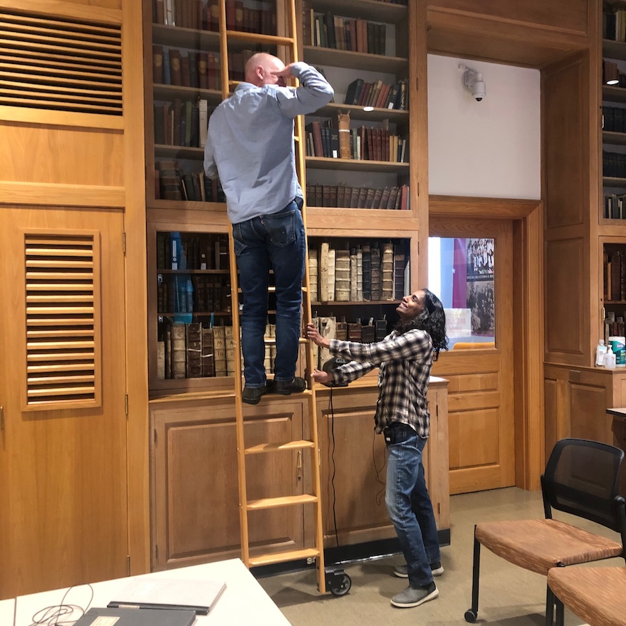 Brock + Tess being silly in the Colby library dedicated to Edwin Arlington Robinson