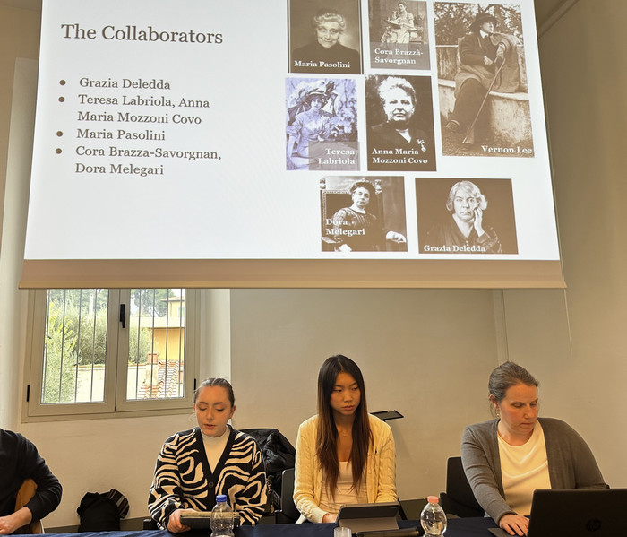 prof hall and students presenting research in florence italy, dec 2025