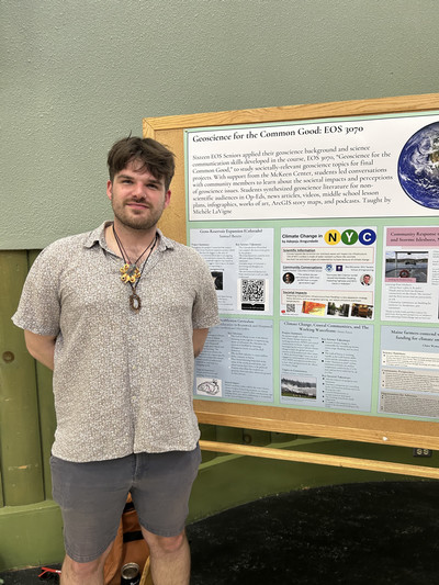 henry zucco25 with poster on coastal community storm impact
