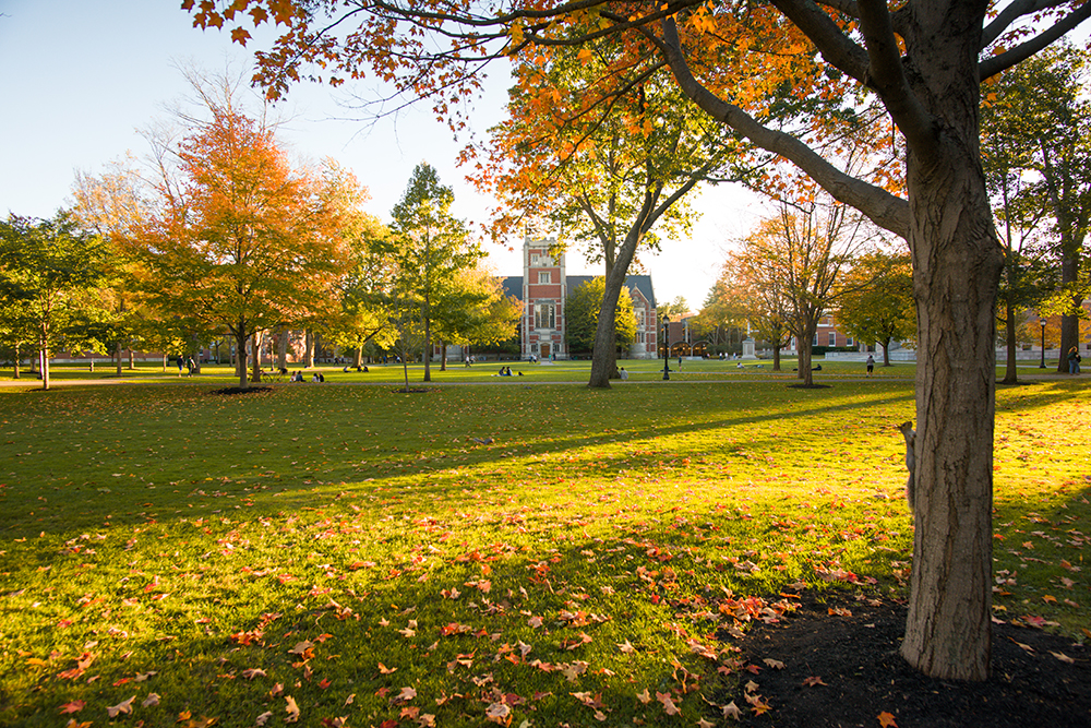 Hubbard Hall in the fall with sunlight streaming through from the side