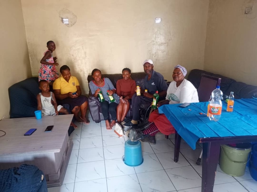 Mukudzei with some of the people in her pilot project.