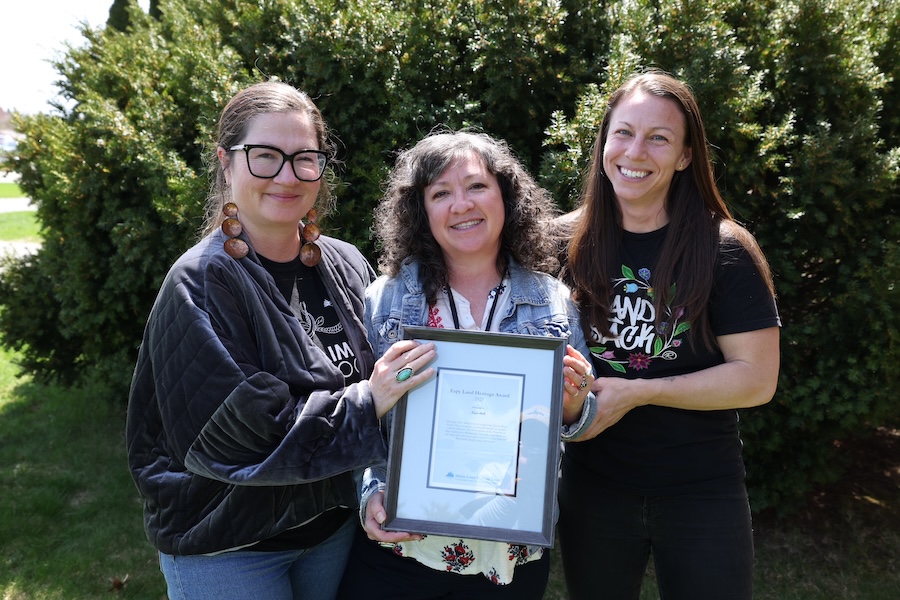 Nicole Francis, Andrea Francis, and Alivia Moore (left to right) of Niweskok, a Wabanaki-led food sovereignty organization, were presented with the 2025 Espy Land Heritage Award, on Tuesday April 29, 2025 at the Maine Land Conservation Conference in Augusta, Maine