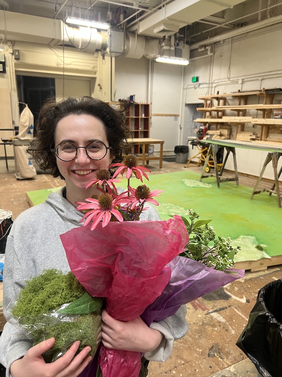 Mira Pickus with some fake flowers for her set