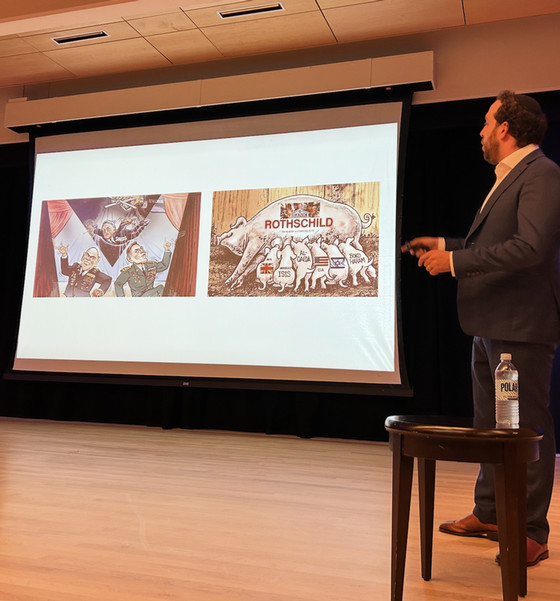 yair rosenberg with antisemitic cartoon slides