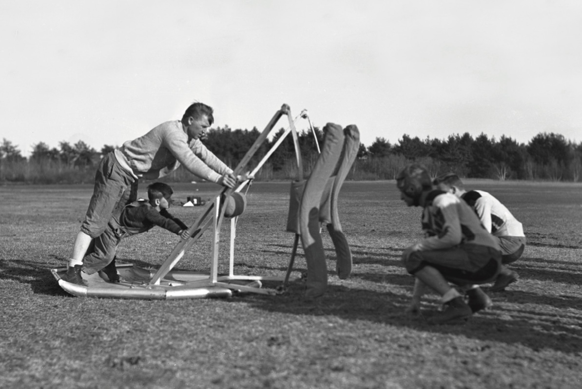 Walsh using a charging sled during a Bowdoin practice.