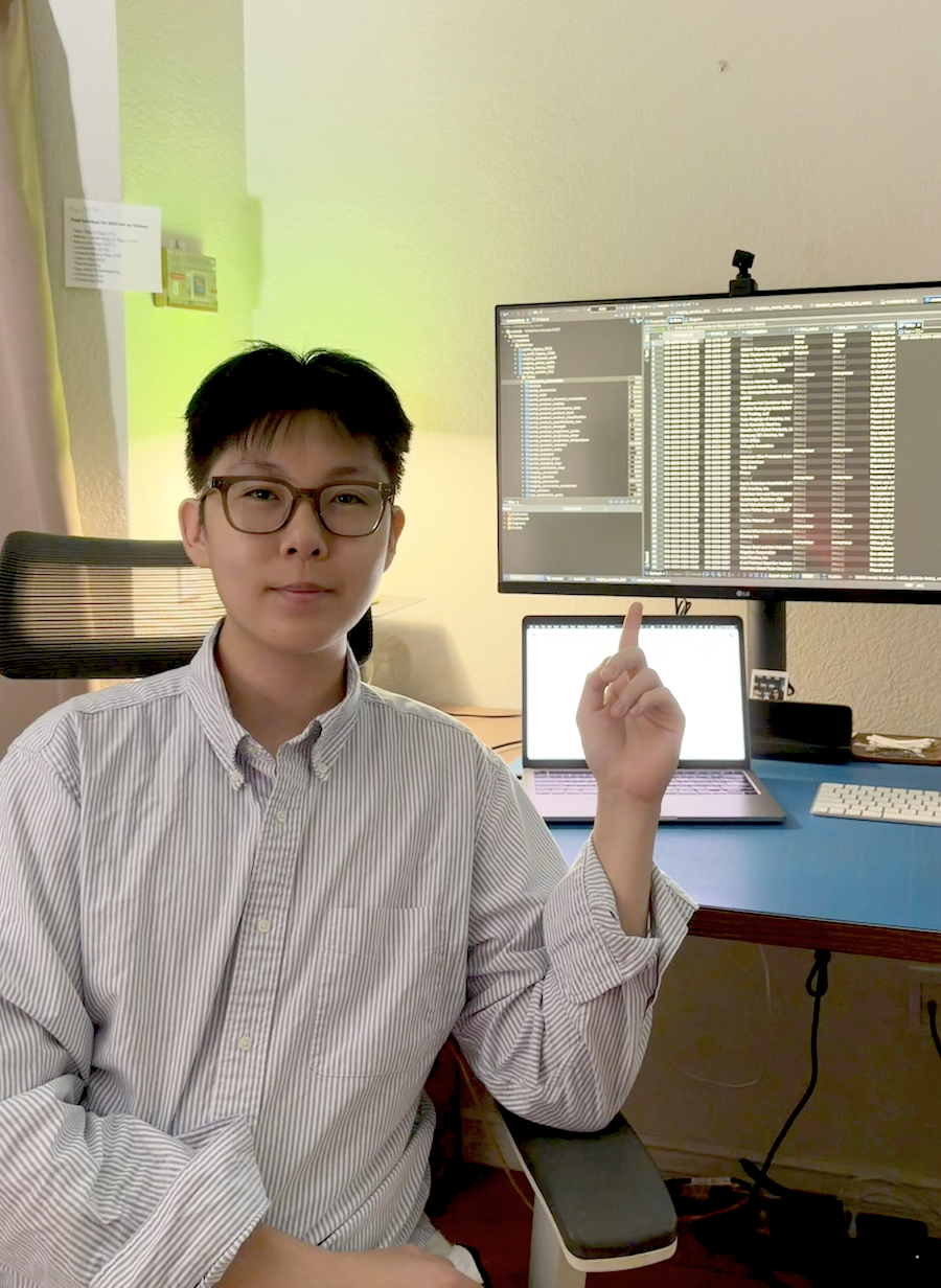 Daniel Lee in front of a computer