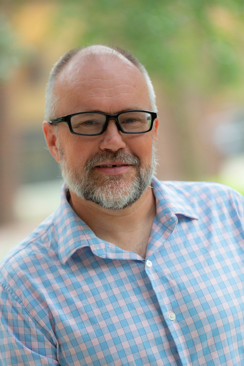 official photo of economist erik nelson 2022