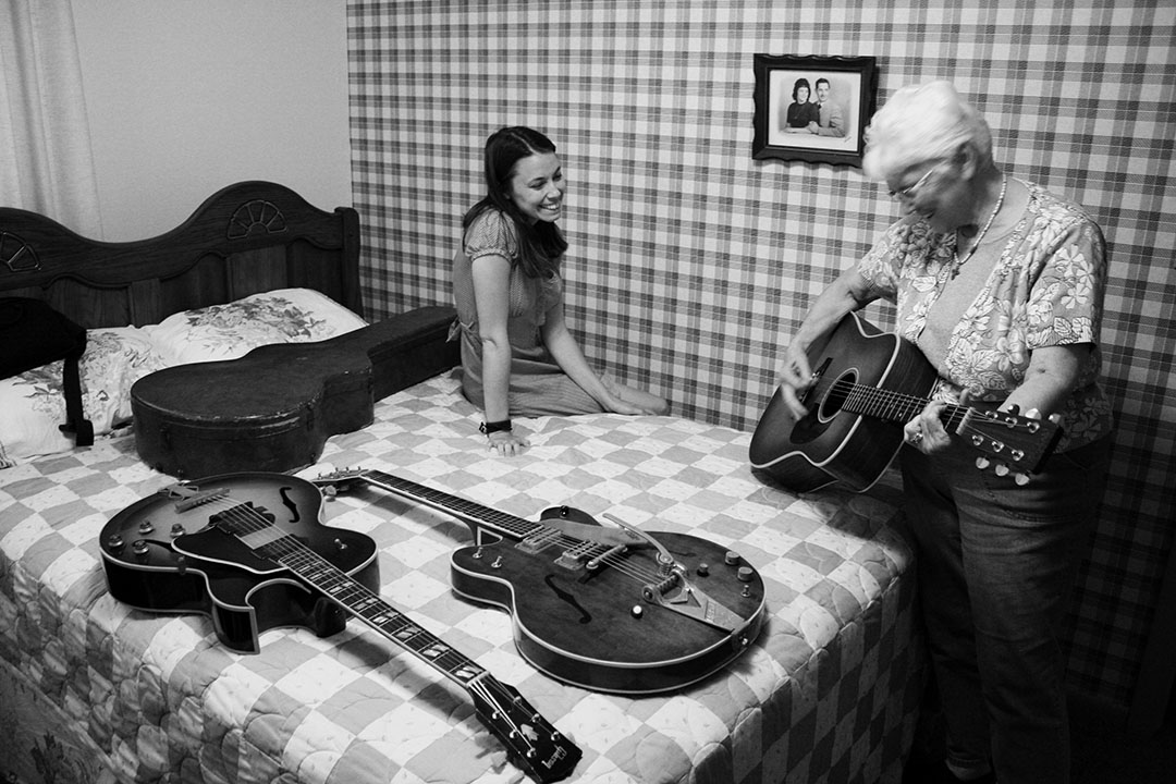 Kerney and her grandmother at Ella’s home in Seville, Ohio, in 2014. Ella is playing a 1958 Martin D-28.