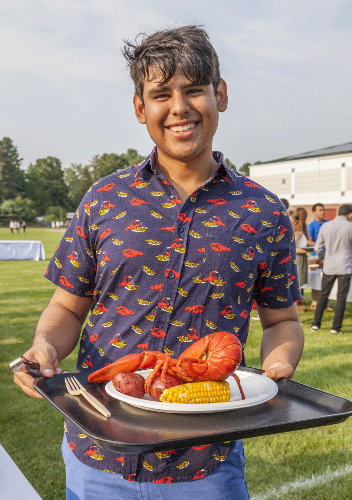 A Bowdoin student in a lobster shirt... with fries?
