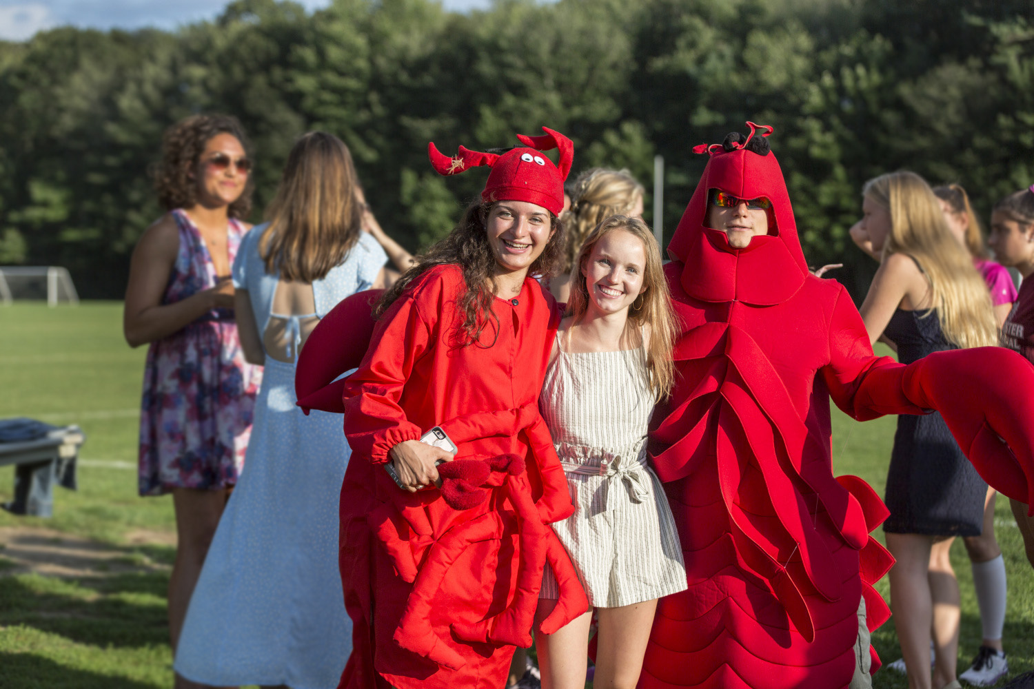 Two Bowdoin students wearing lobster costumes.