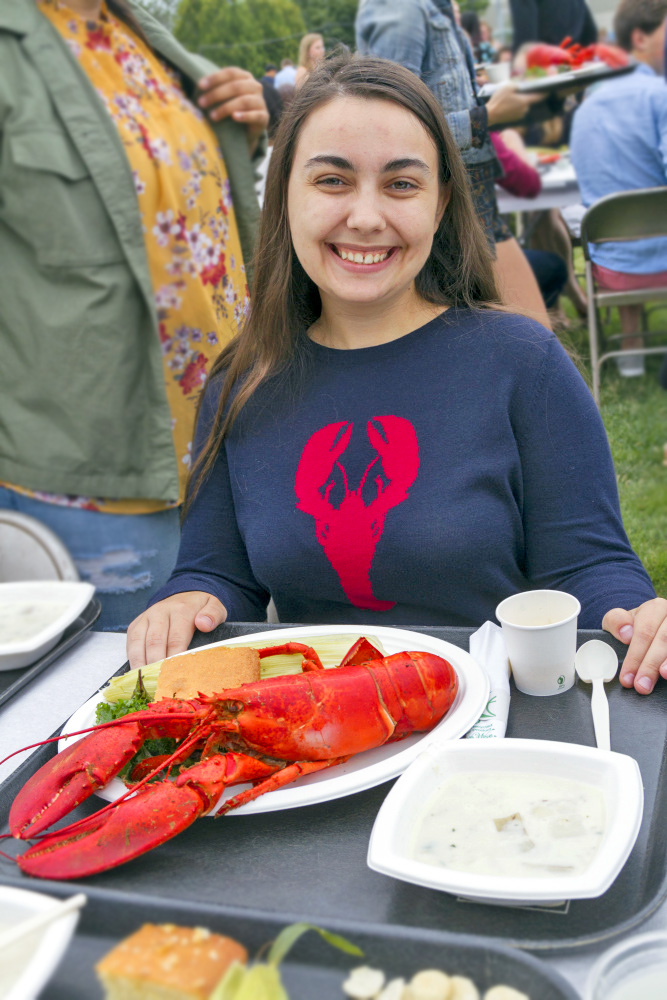 A Bowdoin student wearing a lobster sweater.