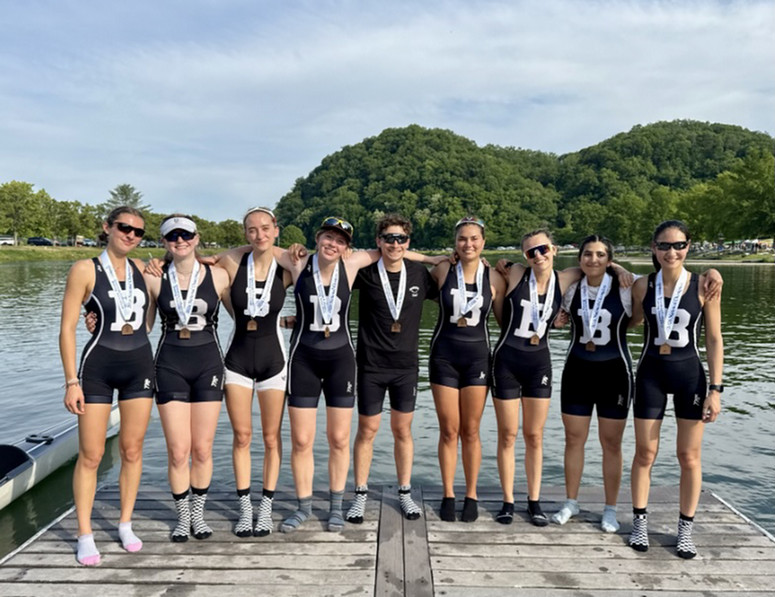 bowdoin women's 2nd varsity 8 crew standing next to the water at ACRA, Oak Ridge 2026