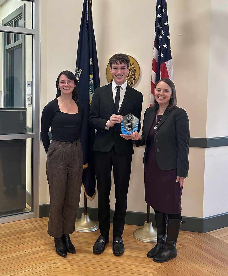 Shawn Jiminez '27 with Maine Secretary of State Shenna Bellows (right) and Vanessa Diaz Gaumond, the state's youth engagement coordinator.