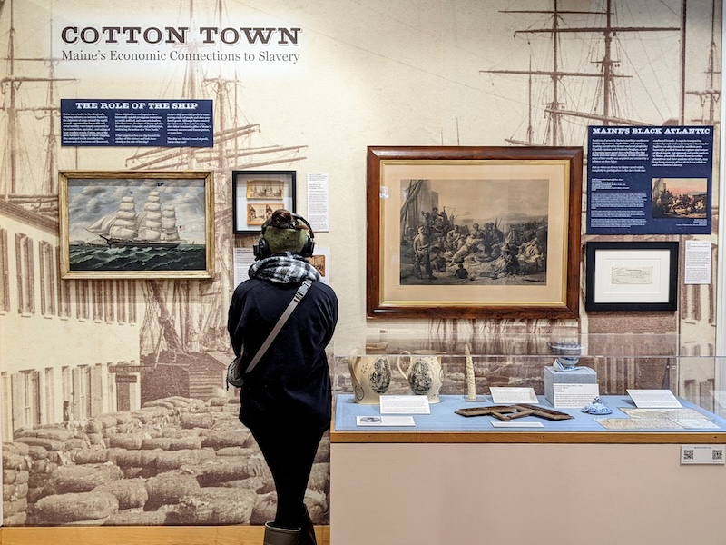 visitor at maine maritime museum's cotton town exhibition by bowdoin students 2021-22