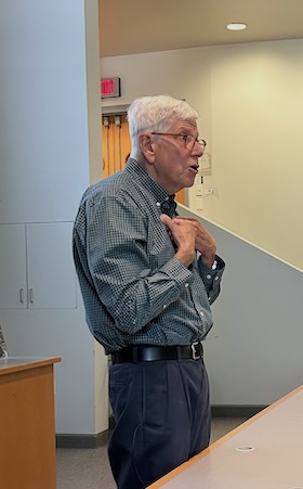prof allen wells giving lecture