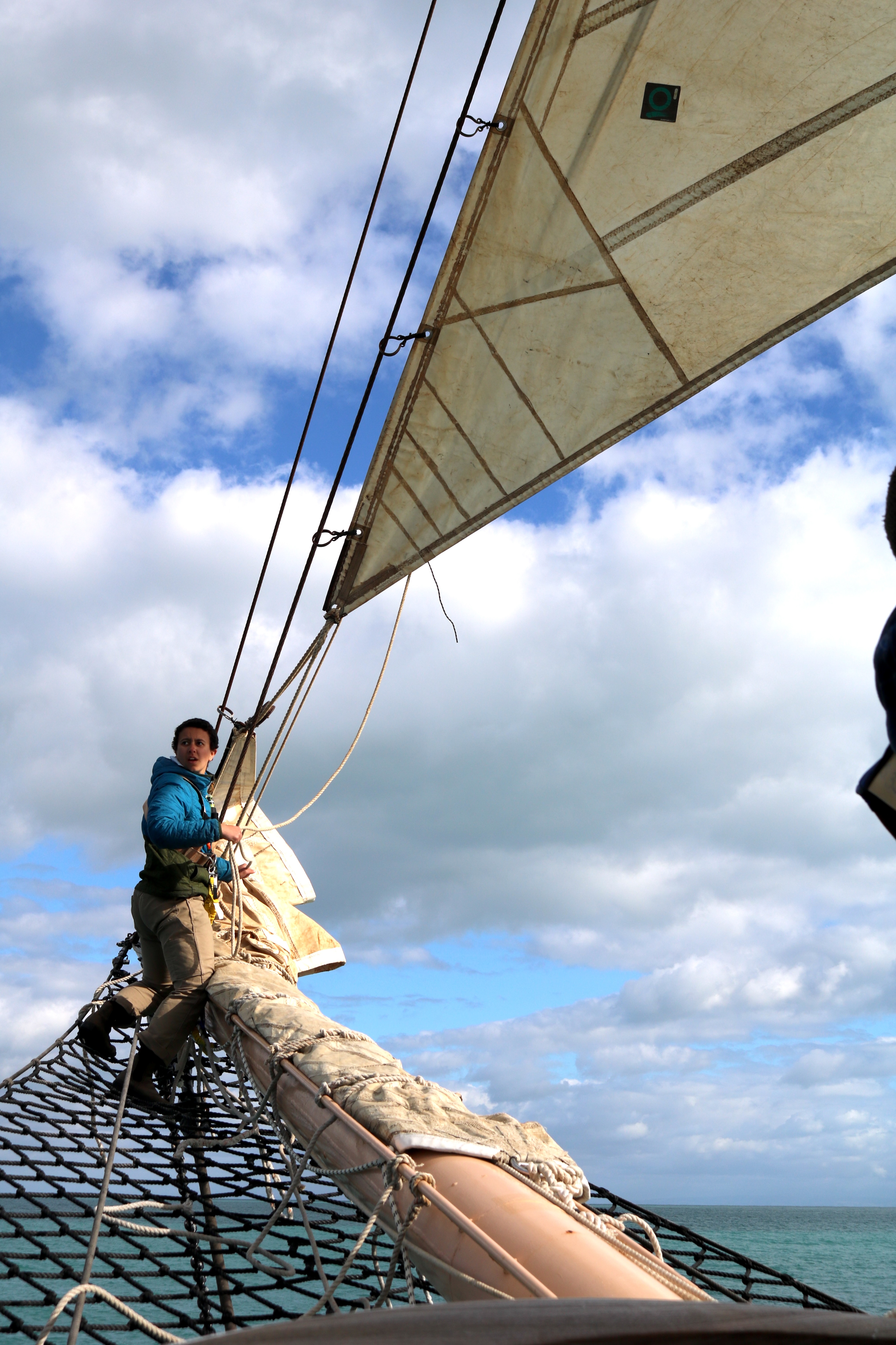 Student sailing on tall ship.