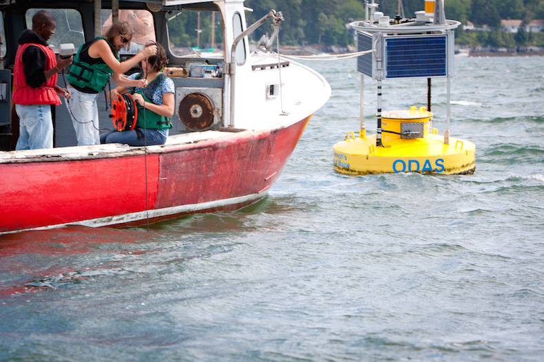 boat next to buoy