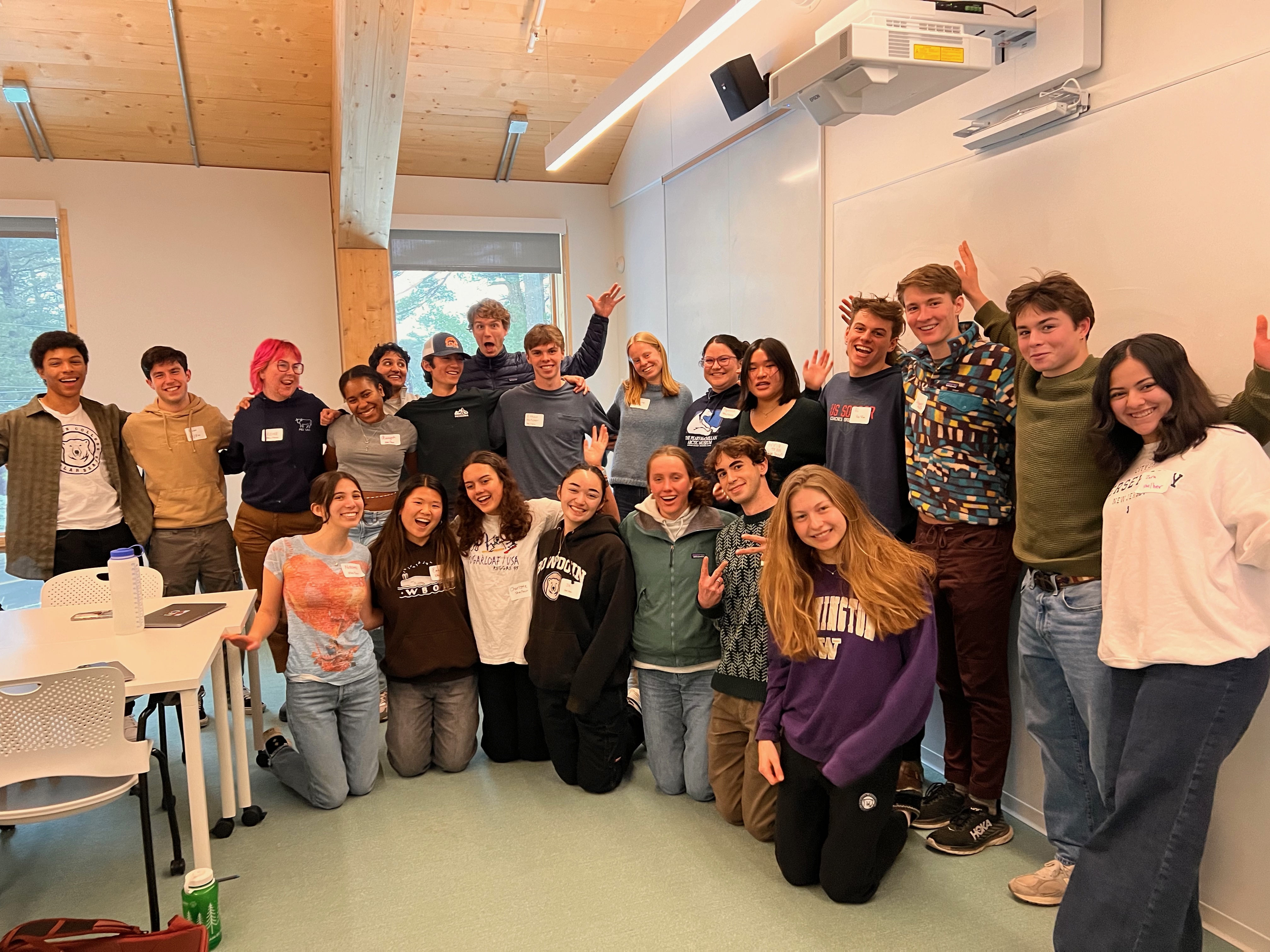 group of students employees posing in classroom