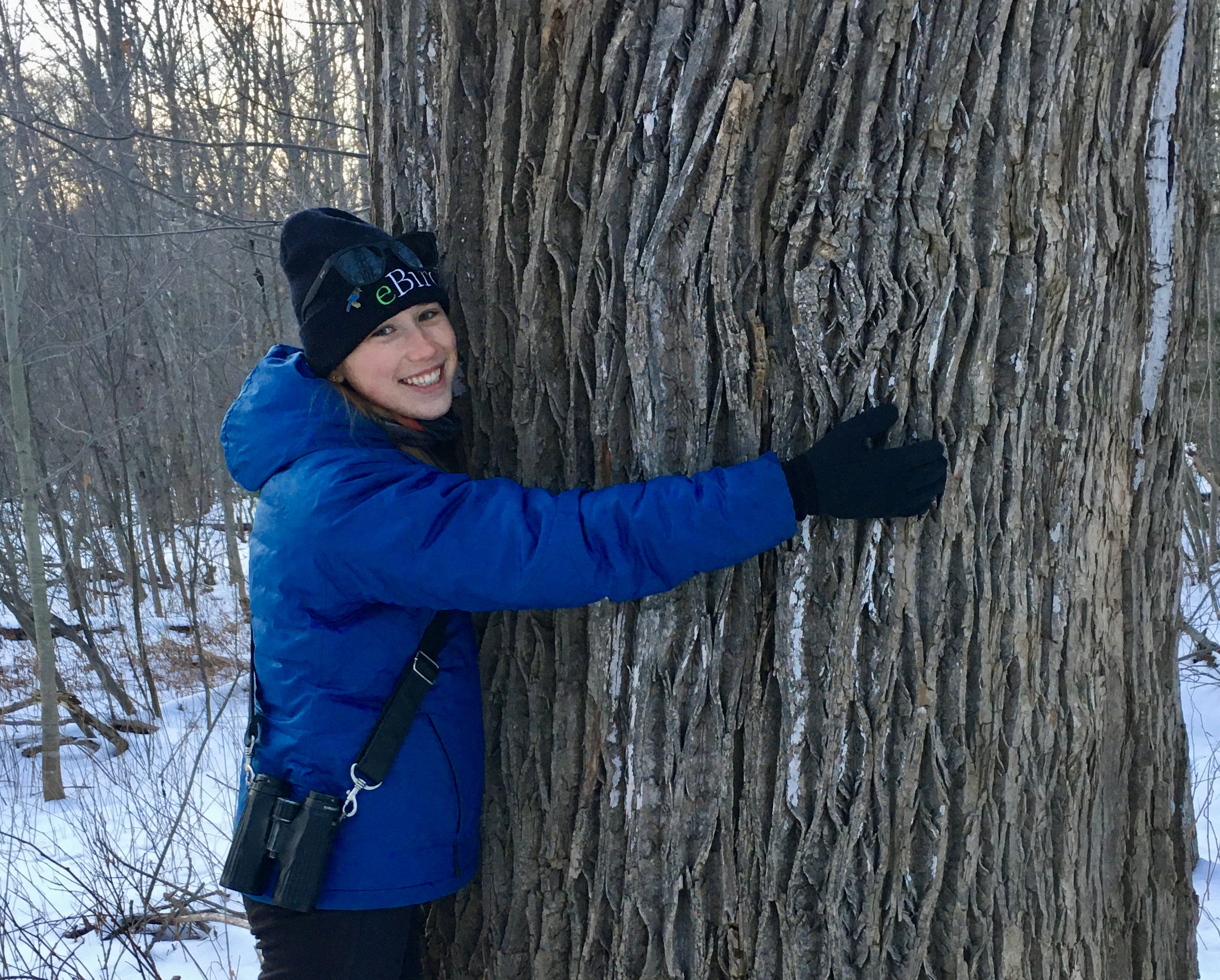 Hayden Keene hugging a tree
