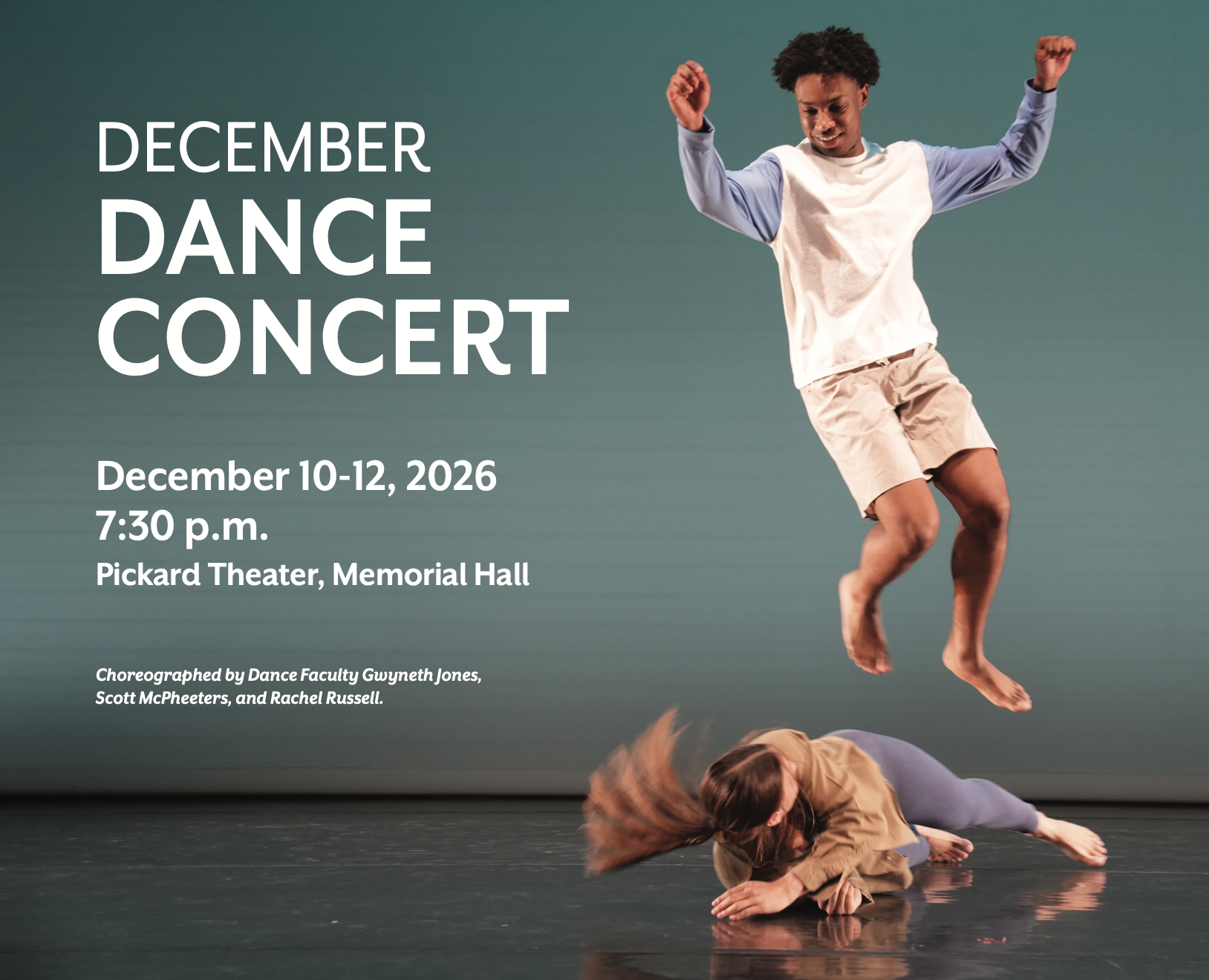 Two students on stage dance, with one leaping playfully over the other one.