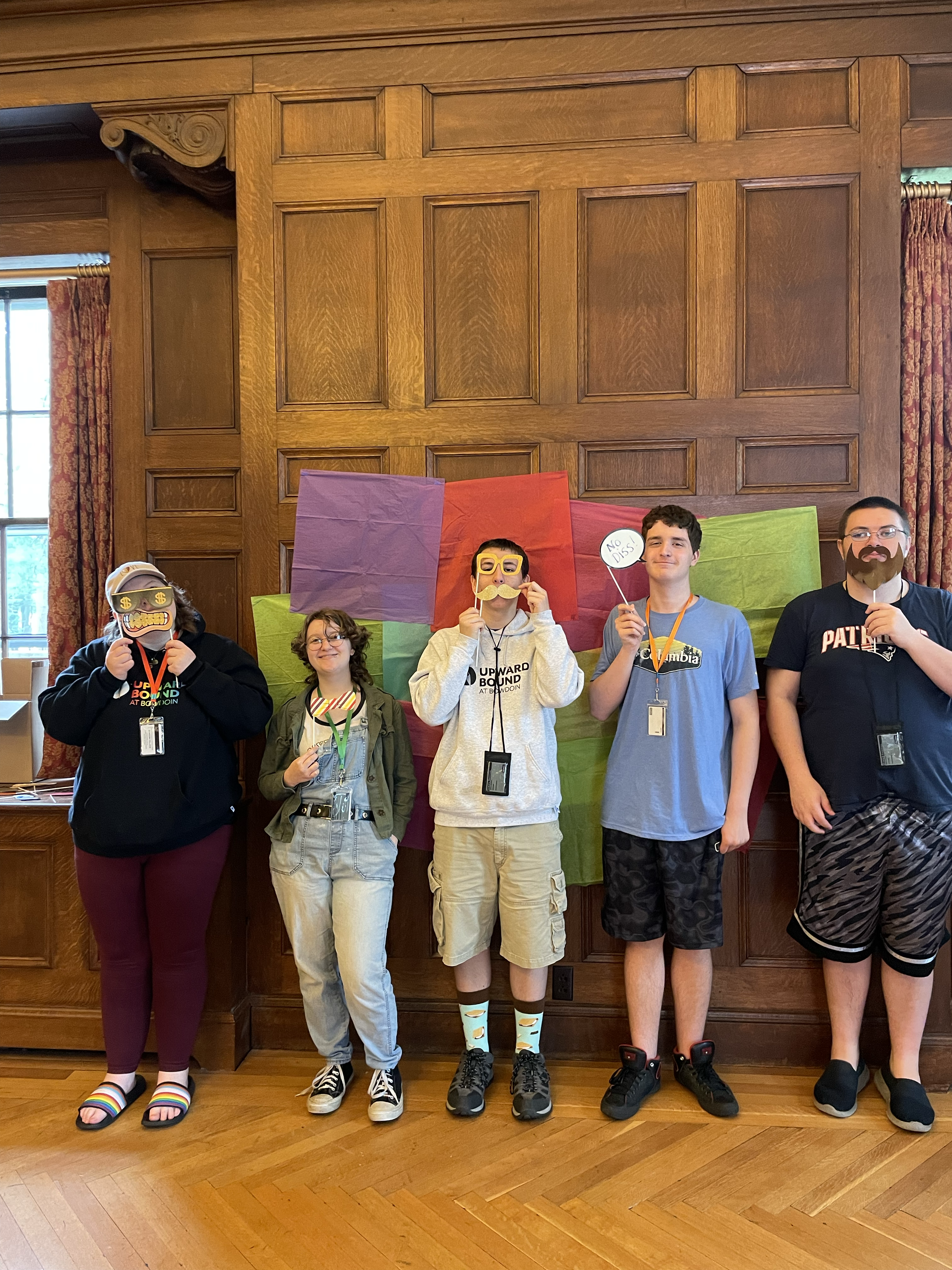 Students pose with photo props