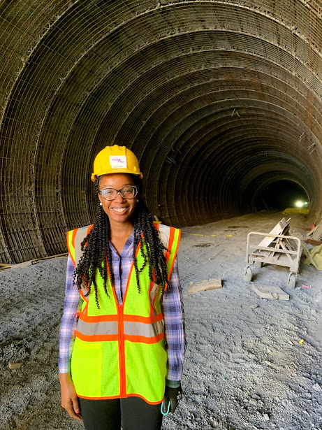 Symone Howard in front of tunnel project